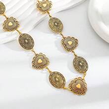 Ein vintage Metall-Goldgürtel, ein goldener herzförmiger ovaler Gürtel, dieser Damengürtel im Western-Stil ist perfekt als Geschenk für eine Freundin. Er kann mit verschiedenen Outfits im Frühling, Sommer, Herbst und Winter kombiniert werden und betont die Taille als Körperschmuckzubehör.