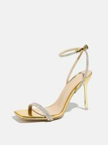 Sandales à talons hauts pour femme, une bride, entièrement ornées de strass, bout carré, fine boucle ornée de strass scintillants, talons aiguilles à la mode en plaqué or brillant, idéales pour le printemps/été, les soirées, les expositions d'art en plein air, la rue, les banquets haut de gamme, matériau en feuille de haute qualité, sandales à talons hauts dorées à la mode et élégantes.