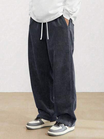 加大码男士灯芯绒宽松直筒裤，纯色休闲街头风，适合春秋季和冬季穿着。