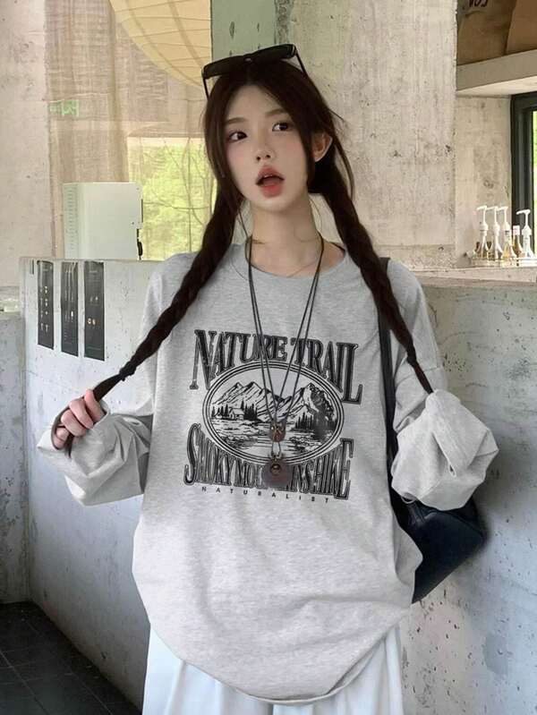 Nova Camiseta Feminina Casual Oversized de Manga Longa com Gola Redonda e Estampa Kawaii para Outono/Inverno