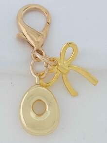 1个A-Z金色泡泡字母可爱吊坠，蝴蝶结装饰，钥匙扣，戒指托，背包挂饰，汽车挂饰，购物，海滩，露营，钱包配饰。适合作为送给女性、朋友和学生的礼物，时尚创意设计，生日礼物装饰，圣诞礼物。 - 金色蝴蝶結 - 查看 27