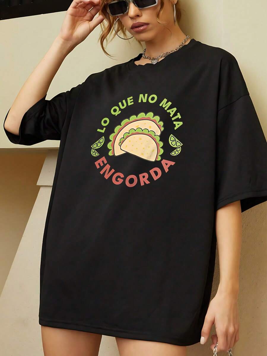 La camiseta gráfica Taco Lover's Delight para hombre presenta un divertido estampado en español que dice "Lo que no te mata, engorda" para un estilo casual, cómodo y único para los amantes de la comida. ¡Extragrande! - Negro - Ver 1