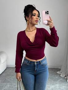 Blusa sexy de manga larga para mujer con corte y detalle metálico en tela negra para un look glamuroso. - Burdeos - Ver 2