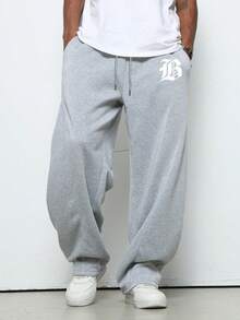 Pantalones de chándal holgados para hombres con cintura de cordón y bolsillos con estampado de letras informales casuales cómodos deportivos estilo urbano999 - Gris - Ver 4