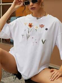 Camiseta con estampado botánico para hombre. Camiseta de algodón suave y transpirable con un elegante estampado floral, perfecta para un look casual. ¡Luce tu estilo único con esta camiseta artística! Talla extragrande. - Blanco - Ver 1