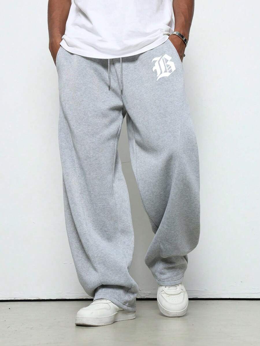 Pantalones de chándal holgados para hombres con cintura de cordón y bolsillos con estampado de letras informales casuales cómodos deportivos estilo urbano999 - Gris - Ver 1