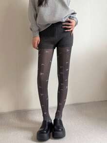 زوج من سراويل الجاكار للنساء ذات الخطوط الرأسية المتباينة اللون مع فيونكة، قطن بدون درز في أصابع القدم