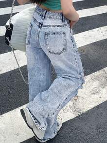 Vaqueros rectos con cintura alta, bolsillos en diagonal y rotos, estilo vaquero