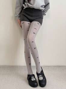 زوج من سراويل الجاكار للنساء ذات الخطوط الرأسية المتباينة اللون مع فيونكة، قطن بدون درز في أصابع القدم