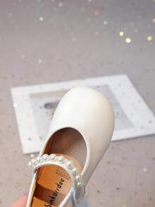 1 par de botas blancas para niñas 2025 nuevas, zapatos planos para niños con suela suave antideslizante de talla 21-30, zapatos de princesa blancos, zapatos blancos pequeños con moño