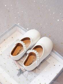 1 par de botas blancas para niñas 2025 nuevas, zapatos planos para niños con suela suave antideslizante de talla 21-30, zapatos de princesa blancos, zapatos blancos pequeños con moño