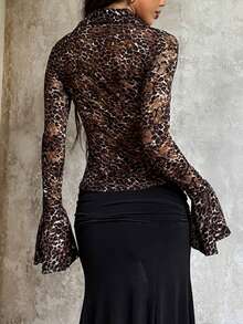 Blusa trasparente e sexy con motivo floreale in pizzo bruciato, da donna, per l'autunno