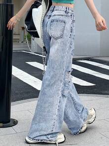 Vaqueros rectos con cintura alta, bolsillos en diagonal y rotos, estilo vaquero