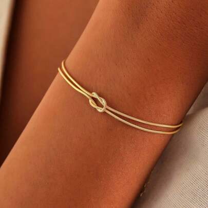 1 pieza Brazalete de acero inoxidable con nudo simple y elegante con baño de oro para un color duradero, para parejas