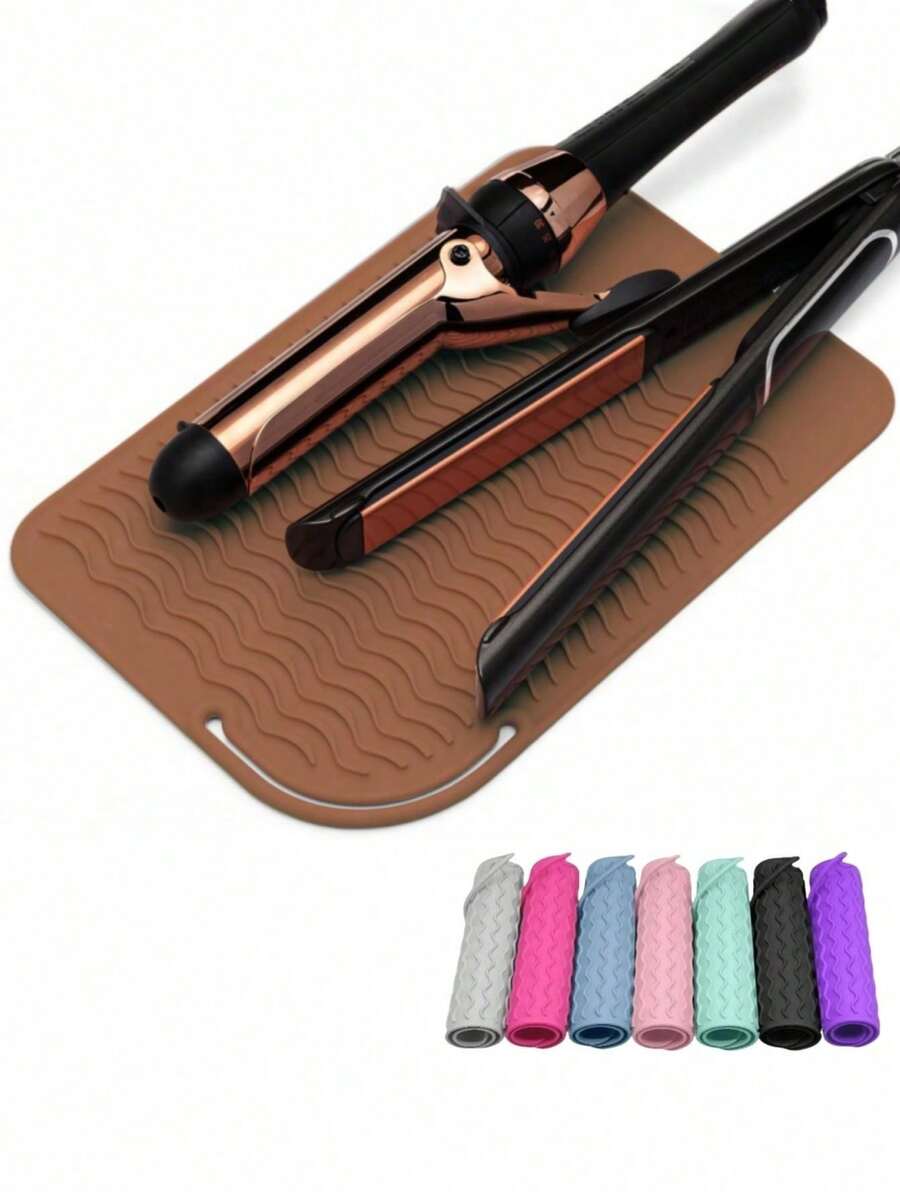 Tấm lót chịu nhiệt cho dụng cụ tạo kiểu tóc, kích thước универсальный phù hợp với máy duỗi và máy uốn tóc, được làm từ chất liệu chịu nhiệt, tiện lợi cho việc cất giữ và mang theo khi đi du lịch. Tấm lót silicon chịu nhiệt này có chức năng cách nhiệt giúp bảo vệ hiệu quả các dụng cụ tạo kiểu tóc của bạn.