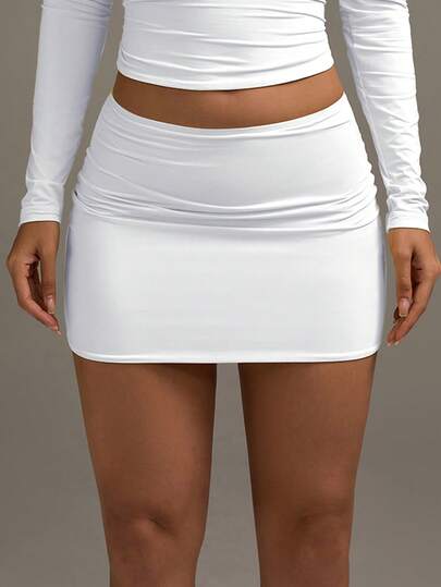 XLLAIS Vikbar vit minikjol med låg midja i två lager, elegant Y2K-stil, söt avslappnad kapselkollektion, lämplig för högtider, semestrar, höst/vinter, halloween och jul