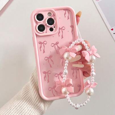 Minimalist Pink Bowknot Elements Basic Phone Case Painted Concave Pink Precision Hole Bowknot Faux Pearl Bracelet Fashionable Thick Precision Hole Simple Anti-Drop Thick Phone Protective Shockproof Case Printed Compatible With Iphone 17/17 Pro/17 Pro Max/16/16 Pro/16 Pro Max/16 Plus/15 XR/7/8 15 Pro Max/12 Pro Max/13 Pro Max/14 Pro Max 13 14 11 12 P14 Women P11 Soft Shell P12 Anti-Drop XS.XR/78P.78GES2 Phone Case Protective Cover Birthday Gift Spring