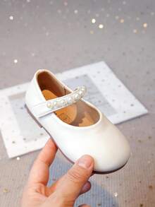 1 par de botas blancas para niñas 2025 nuevas, zapatos planos para niños con suela suave antideslizante de talla 21-30, zapatos de princesa blancos, zapatos blancos pequeños con moño