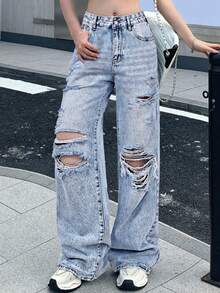 Vaqueros rectos con cintura alta, bolsillos en diagonal y rotos, estilo vaquero