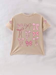 Maglietta a girocollo con stampa a fiocco cartoni animati, casual e morbida con maniche corte per l'estate, adatta per la scuola, lo shopping, lo stile di strada e le vacanze. Comoda maglietta a maniche corte estiva da ragazza, può essere un regalo per familiari e amici. Essenziale quotidiano lavabile in lavatrice, stile di strada. - Albicocca - Visualizzare 6
