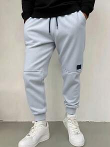 Men's All-Season Sports Joggers, With Adjustable Drawstring, Side Pockets And Patch Logo Design, Suitable For Gym And Running - Light Grey - View 4