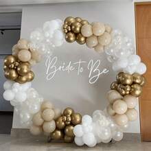 35个10英寸/25.4厘米香槟金、肤色、哑光白气球，适用于节日、生日、婚礼、迎婴派对、性别揭晓派对、鸡尾酒会、圣餐礼、订婚、周年纪念、庆祝活动——提供丝带，非常适合用作拍照背景、拱门和墙面装饰。 - 沙白膚色 - 查看 3
