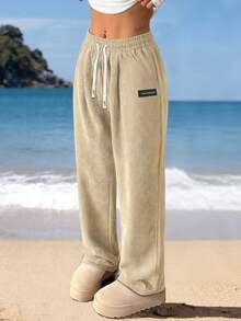 Nuovi pantaloni casual in velluto a coste da donna, di colore unito con tasche con laccetto, traspiranti e confortevoli, adatti per attività quotidiane