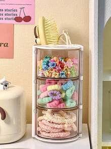 1 caixa de armazenamento giratória multicamadas e estilosa para grampos de cabelo, acessórios de cabelo, elásticos de cabelo, esponjas de maquiagem, joias, anéis e muito mais - organizador à prova de poeira perfeito para sua penteadeira, ideal para decoração de casa, presente para ela e essencial para amantes da beleza. Mantenha seu espaço limpo e elegante!