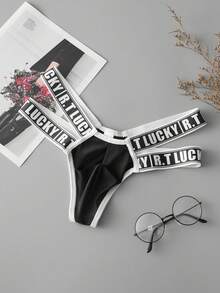 Un nuevo estilo de ropa interior masculina con tela elástica, de talle bajo y transpirable, perfecto para el verano con un diseño elegante y a la moda. - Negro - Ver 1