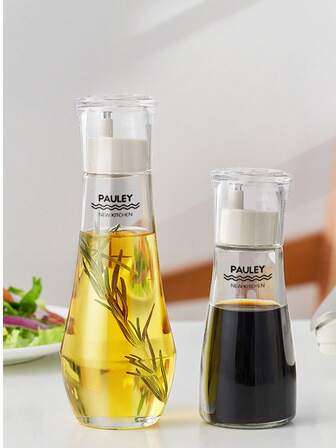 Högkvalitativ glasflaska med dammskydd och självåtervändande oljepip, munstycke i rostfritt stål för enkel mängdkontroll, lämplig för olivolja, vinäger, sojasås och andra kökskryddor, läckagesäker design, transparent utseende, lätt att fylla och rengöra.