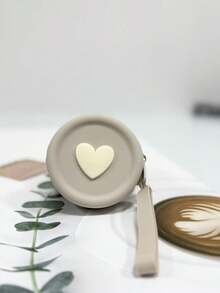 1 pieza Monedero de silicona de estilo simple, bolsa de almacenamiento de gran capacidad y forma redonda, bolsa de color sólido, adecuada para auriculares, cables de datos, lápiz labial, monedas, llaves, etc., tacto suave, fácil de limpiar y cuidar, simple y ligera, espacio razonable, alta portabilidad, adecuada para el hogar, el trabajo, las salidas y los viajes.