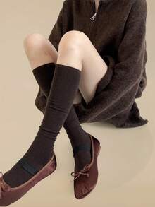 زوج جوارب طويلة سميكة مصنوعة من خليط الصوف