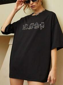 Camiseta gráfica festiva para mujer con un adorable estampado navideño de gato verde musgo. Bonita y cómoda camiseta de algodón esencial, de estilo casual y para las fiestas. Talla extragrande. - Negro - Ver 6