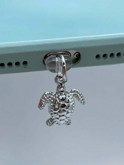 Nuevo enchufe antipolvo de aleación metálica plateada con diseño de tortuga estilo Y2K, apto para puertos de carga Lightning de Apple, Type-C y teléfonos Android