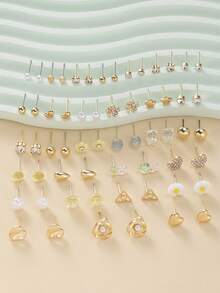 30 pares de pendientes de perla falsa de metal y resina con diseños de corazón, oso, rhinestone y margarita. Conjunto de pendientes de moda casual para mujer