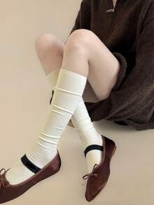 زوج جوارب طويلة سميكة مصنوعة من خليط الصوف