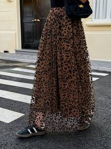 Look Polly Jupe élégante décontractée à taille haute léopard pour femmes en automne-hiver. Style de vacances à la plage digne, avec un sens du style de l'argent ancien. Vêtements occidentaux pour femmes pour les invités de mariage. Jupe en forme de parapluie, imprimé guépard, tenue de Thanksgiving pour femmes