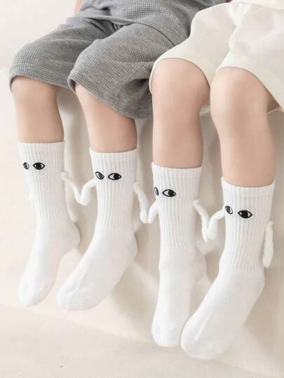 2 pares de calcetines de tubo medio cómodos, transpirables y suaves con succión magnética para hombres y mujeres en otoño e invierno