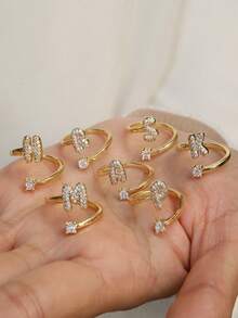 This Is A Stylish And Simple Asymmetrical Copper A-Z Ring With An Adjustable Opening And 26 English Initials For Women. It Is Suitable For Daily Wear And Casual Entertainment. It Is A Gift For Friends And Couples At Festivals And Gatherings!