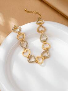 1 pieza Brazalete de aleación elegante y versátil de alta gama con corazón hueco y diseño minimalista, adecuado para uso diario de mujeres