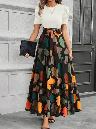 Keke Bloomly 优雅 A 字型圣诞、秋季、冬季和新年女装，泡泡袖和蝴蝶结细节 - 充满活力的橙色/蓝绿色/黑色/白色/绿色银杏印花，圆领，可机洗，适合春夏季休闲穿着，适合日常、派对和半正式场合。