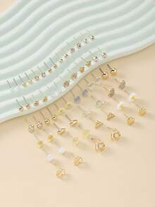 30 pares de pendientes de perla falsa de metal y resina con diseños de corazón, oso, rhinestone y margarita. Conjunto de pendientes de moda casual para mujer