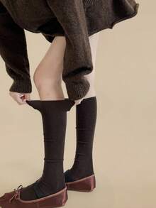 زوج جوارب طويلة سميكة مصنوعة من خليط الصوف