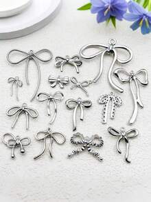 Ciondolo minimalista e carino a fiocco, ciondolo in lega di alluminio a nastro vuoto, ciondolo a fiocco carino in lega vuota per la realizzazione di gioielli fai-da-te, adatto per collane, orecchini, cinturini per telefono, charm per borse, portachiavi, decorazioni per vacanze, gioielli, ideale per regali di San Valentino, Natale, Capodanno