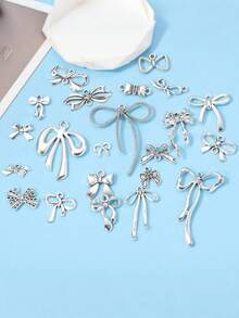 Ciondolo minimalista e carino a fiocco, ciondolo in lega di alluminio a nastro vuoto, ciondolo a fiocco carino in lega vuota per la realizzazione di gioielli fai-da-te, adatto per collane, orecchini, cinturini per telefono, charm per borse, portachiavi, decorazioni per vacanze, gioielli, ideale per regali di San Valentino, Natale, Capodanno