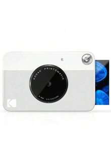 Kodak Cámara instantánea PRINTOMATIC: Conexión directa al teléfono para una impresión cómoda. Tecnología sin tinta para una claridad duradera. Combinación de colores sencilla y contrastante. Captura momentos de la vida al instante. Viene en una caja de regalo gris y blanca. - Caja de regalo gris y blanca - Ver 4