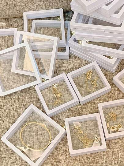 Caixa de filme transparente com 10 unidades para guardar brincos, joias, anéis, pulseiras e colares. Ideal para armazenamento portátil de joias, anéis, pulseiras e colares, com proteção contra poeira e oxidação. Perfeita para guardar brincos, anéis e colares, esta caixa de filme PE é perfeita para exibir joias delicadas e resistentes à oxidação.