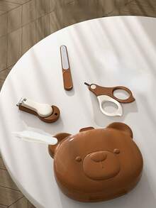 5件套棕色婴儿指甲护理套装卡通便携设计指甲剪、指甲钳、鼻镊指甲锉收纳盒圆形刀片防止意外受伤专业婴儿设计带指甲钳带碎屑收集功能PP+不锈钢材质