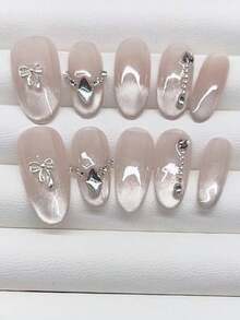 10 miếng dán móng tay hình oval thủ công, thiết kế nơ cổ kiểu mắt mèo ombre màu hồng nude. Tối giản và thời trang, có thể tháo rời và tái sử dụng, phù hợp với mọi phong cách của các cô gái. - Nhiều màu - Xem 1