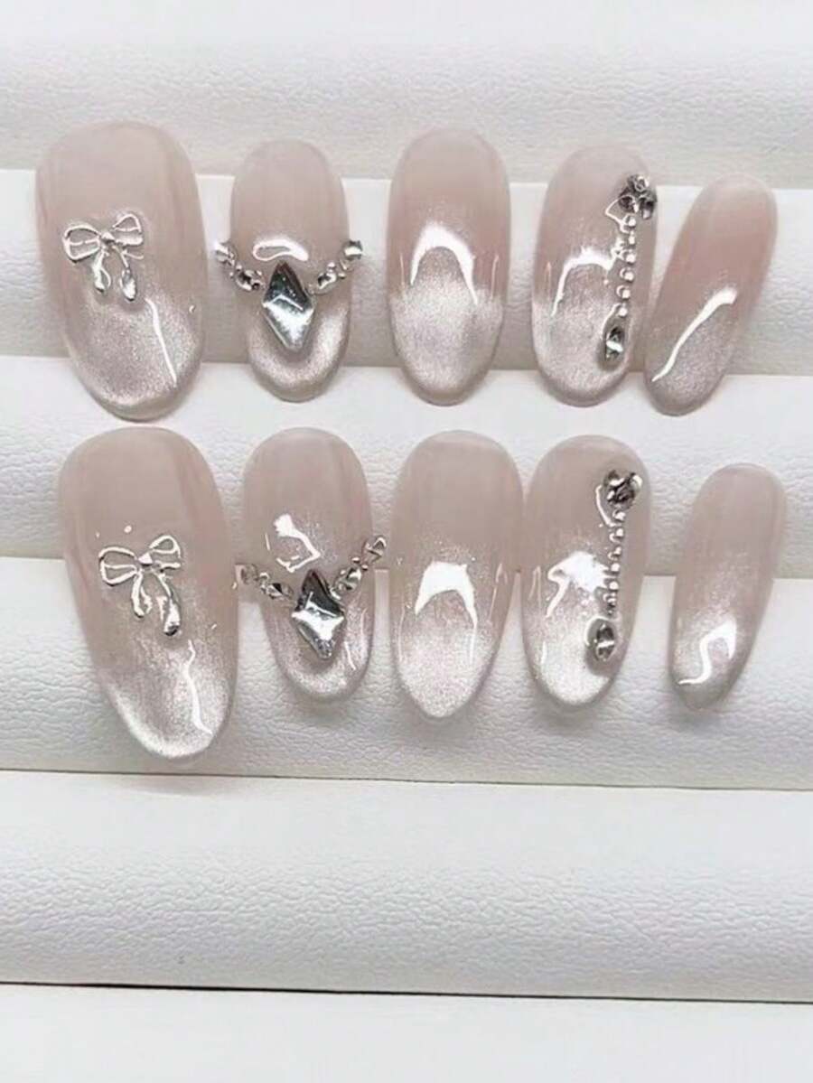 10 miếng dán móng tay hình oval thủ công, thiết kế nơ cổ kiểu mắt mèo ombre màu hồng nude. Tối giản và thời trang, có thể tháo rời và tái sử dụng, phù hợp với mọi phong cách của các cô gái. - Nhiều màu - Xem 1